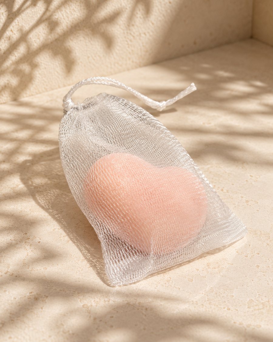 The heart-shaped pink soap in its foaming net